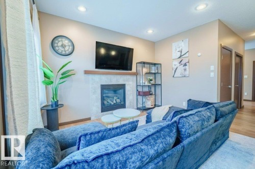 11904 22 Avenue, Edmonton, AB - Indoor Photo Showing Living Room With Fireplace