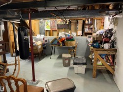 Concrete floor with exposed structural beams and ductwork - 