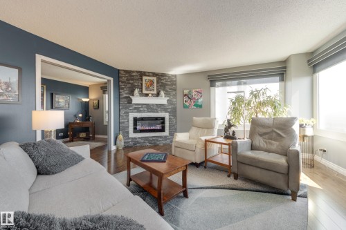 1406 12303 Jasper Avenue, Edmonton, AB - Indoor Photo Showing Living Room With Fireplace