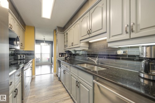 1406 12303 Jasper Avenue, Edmonton, AB - Indoor Photo Showing Kitchen With Double Sink