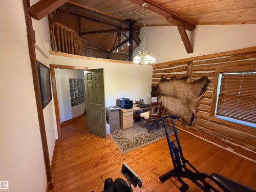 Vaulted wood-paneled ceiling with exposed beams - 63218 Range Road 254, Rural Westlock County, AB 