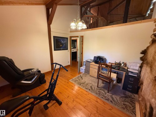 Vaulted wood-finish ceiling with exposed beams - 63218 Range Road 254, Rural Westlock County, AB 