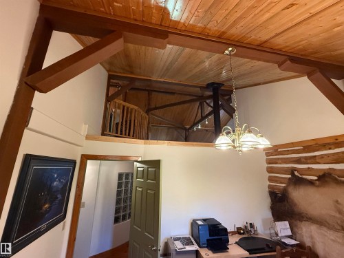 Vaulted wood-paneled ceilings with exposed wood beams - 63218 Range Road 254, Rural Westlock County, AB 