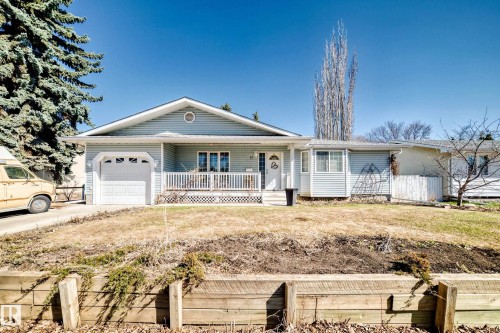 Ranch-style residence featuring light blue siding and white trim - 17 Springfield Crescent, St. Albert, AB - Outdoor With Deck Patio Veranda
