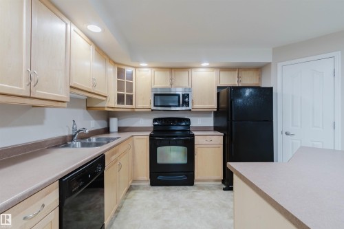 204 1320 Rutherford Road, Edmonton, AB - Indoor Photo Showing Kitchen With Double Sink