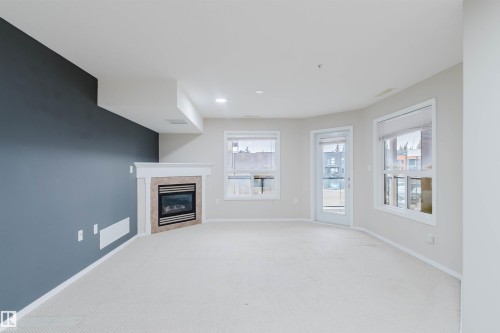 204 1320 Rutherford Road, Edmonton, AB - Indoor With Fireplace