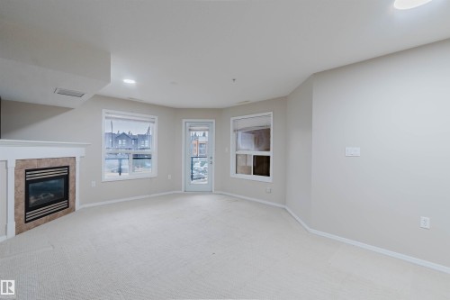 204 1320 Rutherford Road, Edmonton, AB - Indoor With Fireplace
