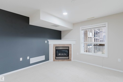 204 1320 Rutherford Road, Edmonton, AB - Indoor With Fireplace