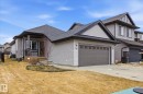 Light gray vinyl siding with dark gray trim and roof shingles - 28 Hewitt Circle, Spruce Grove, AB  - Outdoor 