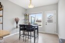 Light gray walls with light wood-finish flooring - 28 Hewitt Circle, Spruce Grove, AB  - Indoor Photo Showing Other Room 