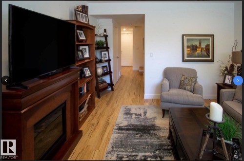 10958 80 Avenue, Edmonton, AB - Indoor Photo Showing Living Room With Fireplace
