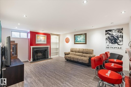 30 Farmstead Avenue, St. Albert, AB - Indoor Photo Showing Living Room With Fireplace
