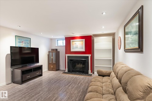 30 Farmstead Avenue, St. Albert, AB - Indoor Photo Showing Living Room With Fireplace
