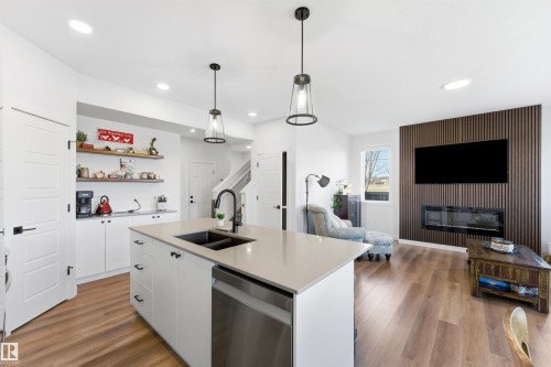 364 Genesis Villa(S), Stony Plain, AB - Indoor Photo Showing Kitchen With Fireplace With Double Sink With Upgraded Kitchen