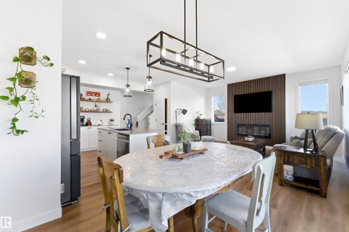 364 Genesis Villa(S), Stony Plain, AB - Indoor Photo Showing Dining Room With Fireplace