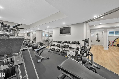5121 Woolsey Link, Edmonton, AB - Indoor Photo Showing Gym Room