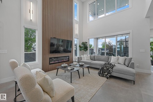 5121 Woolsey Link, Edmonton, AB - Indoor Photo Showing Living Room With Fireplace