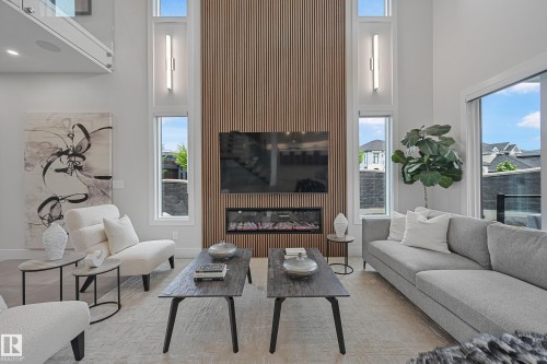 5121 Woolsey Link, Edmonton, AB - Indoor Photo Showing Living Room With Fireplace