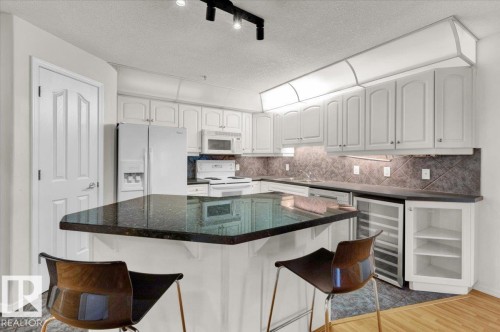 103 9008 99 Avenue, Edmonton, AB - Indoor Photo Showing Kitchen With Upgraded Kitchen