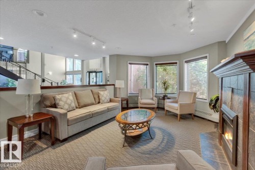 103 9008 99 Avenue, Edmonton, AB - Indoor Photo Showing Living Room