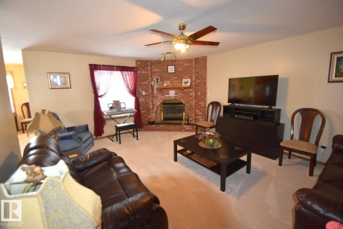 5204 1 Avenue E, Boyle, AB - Indoor Photo Showing Living Room With Fireplace