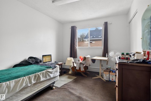 9732 75 Avenue, Edmonton, AB - Indoor Photo Showing Bedroom