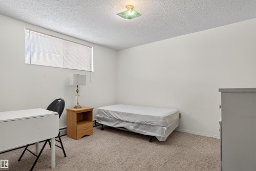 9732 75 Avenue, Edmonton, AB - Indoor Photo Showing Bedroom
