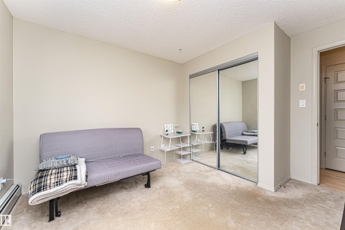 Wall-to-wall carpeting and neutral wall tones - 219 646 Mcallister Loop, Edmonton, AB - Indoor