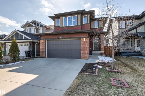 Contemporary exterior featuring brick accents and horizontal siding - 9812 224 Street, Edmonton, AB - Outdoor With Facade