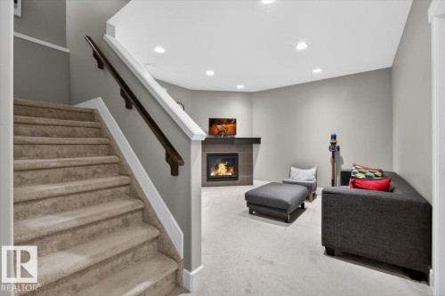 17851 8 Avenue, Edmonton, AB - Indoor Photo Showing Other Room With Fireplace
