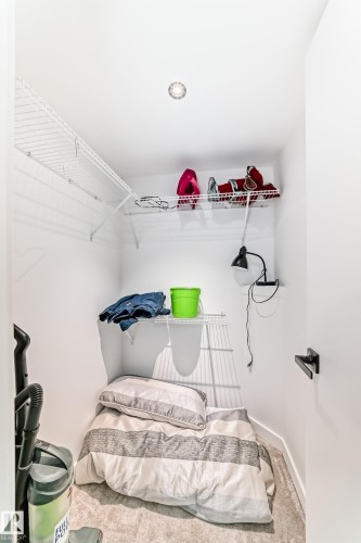 Compact utility space featuring white walls and a recessed ceiling light - 5263 47 Ave, Calmar, AB - Indoor With Storage