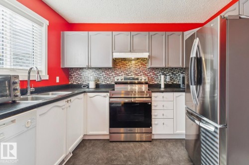 15043 132 Street, Edmonton, AB - Indoor Photo Showing Kitchen With Double Sink
