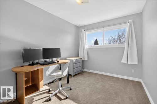 Carpeted room with light gray walls and white trim - 13508 81 Street, Edmonton, AB - Indoor Photo Showing Office