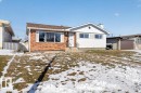 Single-story residence featuring a brick facade, white siding, and a brown shingle roof - 13508 81 Street, Edmonton, AB  - Outdoor 