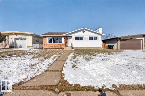 Ranch-style exterior featuring a combination of white siding and red brick - 13508 81 Street, Edmonton, AB - Outdoor