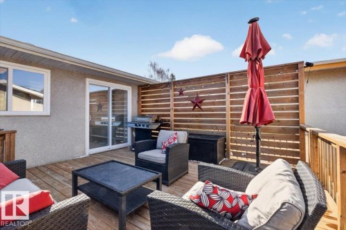 Expansive wood deck with horizontal slat privacy fencing - 13508 81 Street, Edmonton, AB - Outdoor With Deck Patio Veranda With Exterior