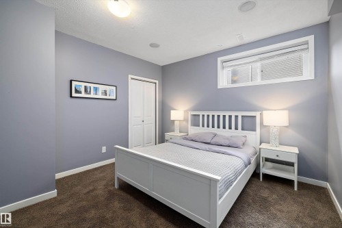 Bedroom featuring a neutral gray wall color and plush carpet flooring - 1586 Chapman Way, Edmonton, AB - Indoor Photo Showing Bedroom