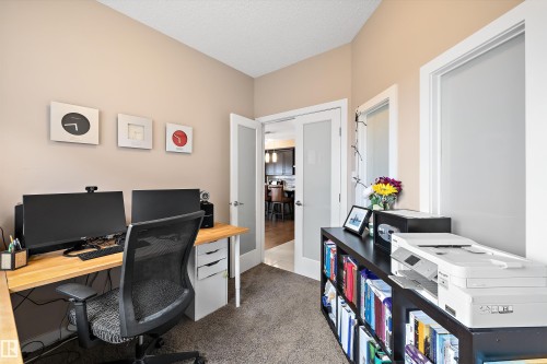 Dedicated office space featuring carpet flooring and neutral wall tones - 1586 Chapman Way, Edmonton, AB - Indoor Photo Showing Office