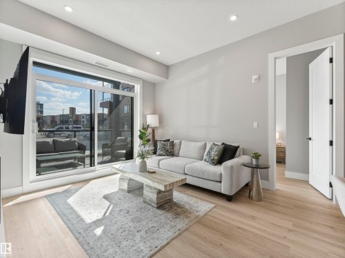 101 7471 May Common, Edmonton, AB - Indoor Photo Showing Living Room