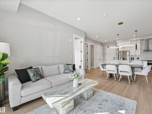 101 7471 May Common, Edmonton, AB - Indoor Photo Showing Living Room