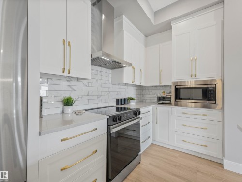 101 7471 May Common, Edmonton, AB - Indoor Photo Showing Kitchen With Upgraded Kitchen