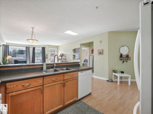 103 9120 156 Street Nw, Edmonton, AB - Indoor Photo Showing Kitchen With Double Sink