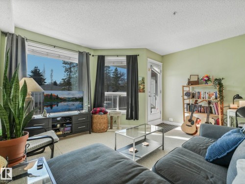 103 9120 156 Street Nw, Edmonton, AB - Indoor Photo Showing Living Room