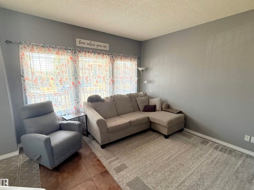 73 Birchmont Drive, Leduc, AB - Indoor Photo Showing Living Room