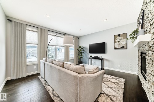 5630 Juchli Avenue, Edmonton, AB - Indoor Photo Showing Living Room With Fireplace