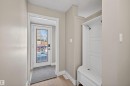 Entryway featuring wood-finish flooring and light neutral wall paint - 11 Greenfield Estates, St. Albert, AB  - Indoor Photo Showing Other Room 