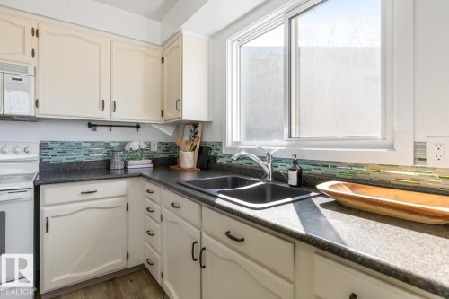 6908 19 Avenue, Edmonton, AB - Indoor Photo Showing Kitchen With Double Sink