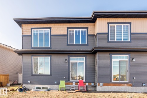 Multi-level exterior featuring horizontal siding and shake siding - 6607 50A Avenue, Beaumont, AB - Outdoor With Exterior