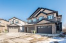 Contemporary exterior featuring a stone and siding facade - 6607 50A Avenue, Beaumont, AB  - Outdoor With Facade 