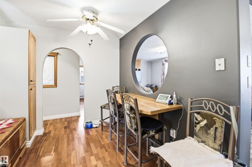 Warm wood-finish flooring throughout the space - 3920 35A Avenue, Red Deer, AB - Indoor Photo Showing Dining Room